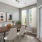 a dining room table with chairs