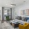 a living room with a couch and chairs