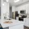 a kitchen with white cabinets